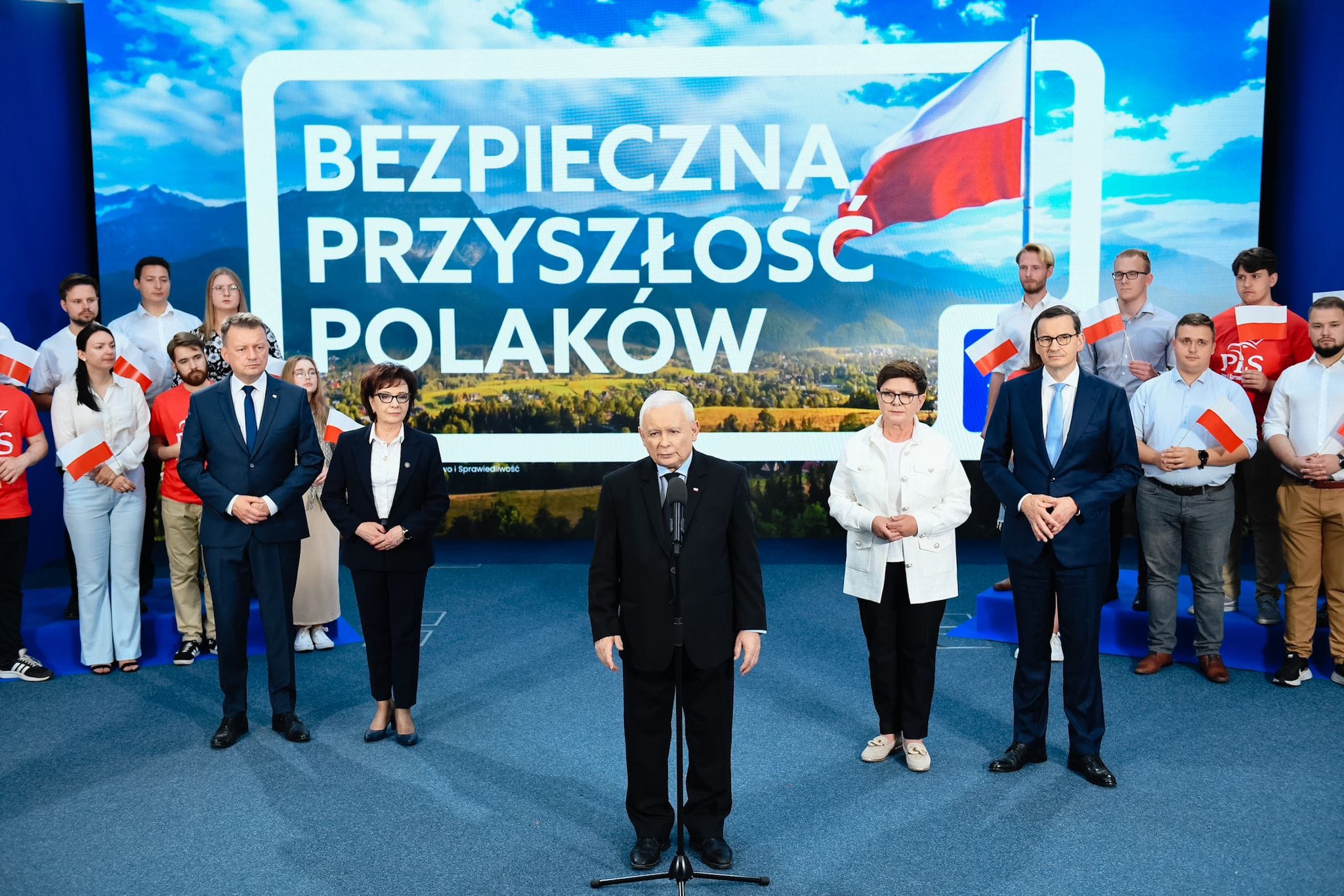 Premier Jarosław Kaczyński, prezes Prawo i Sprawiedliwość jasno - Jesteśmy formacją, która gwarantuje bezpieczną przyszłość Polaków. 15 października zwyciężymy.